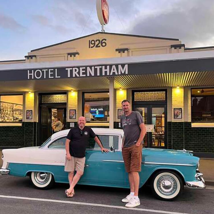 The owners and their classic car out the front of Hotel Trentham in the heart of Trentham.